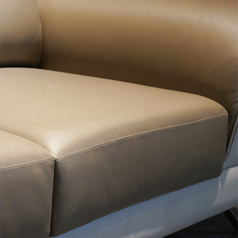 Close-up of a beige leather sofa
