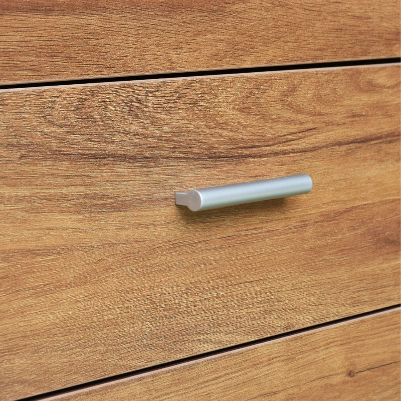 Wooden drawer with a metallic handle