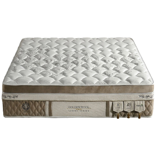 Mattress with 'Golden Wool' branding on a white background