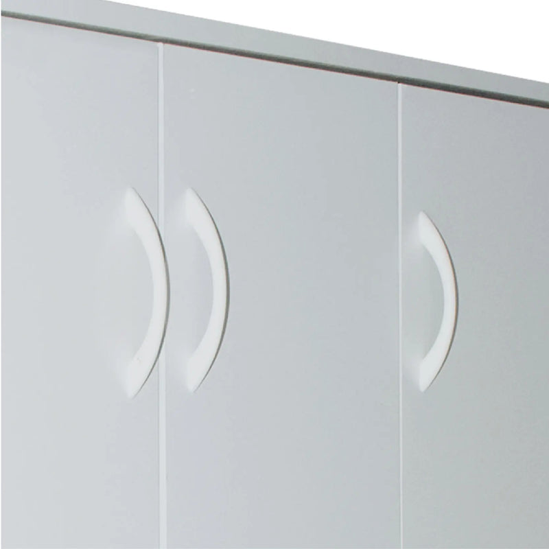 Close-up of a white wardrobe with curved handles on a white background