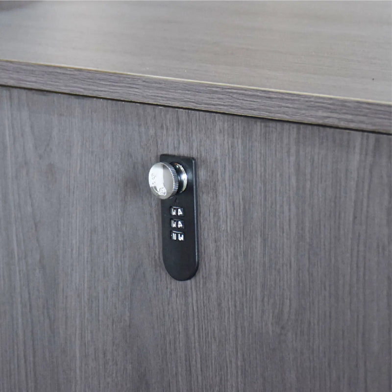 Lock on a wooden cabinet with a metallic knob