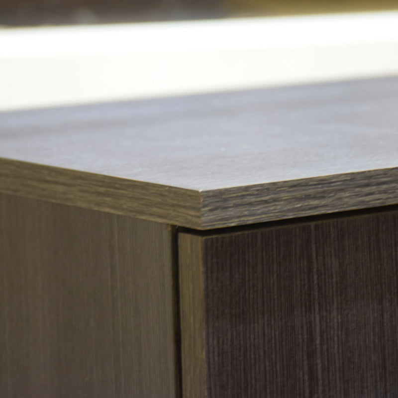 Close-up of a wooden furniture corner with a light-colored top.