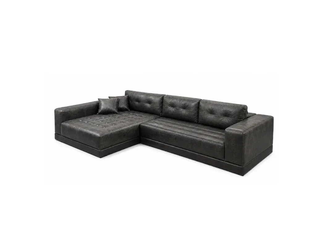 Sofa L shape kelabu gelap bertekstur tufted dengan chaise sebelah kiri, dirakam pada sudut tiga suku