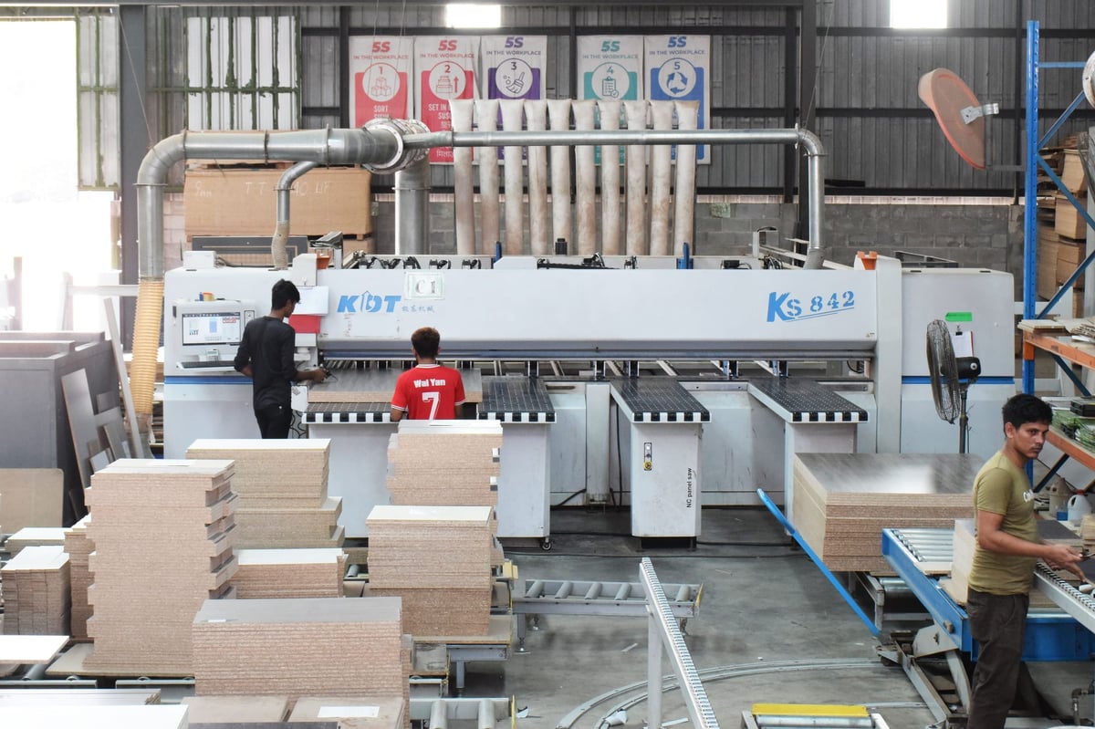 Precision cabinetry production line at TD Furniture factory in Lahat, Perak.