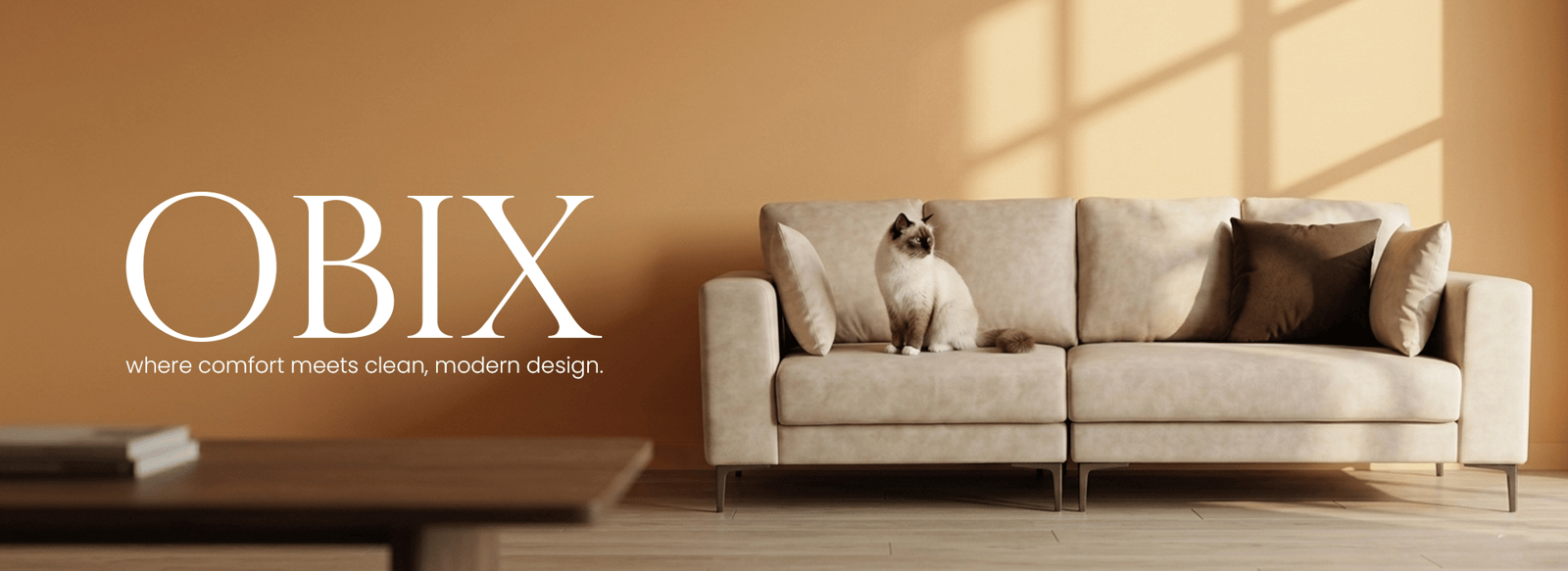 OBIX modular fabric sofa with a cat lounging on the cushion in a bright living room.