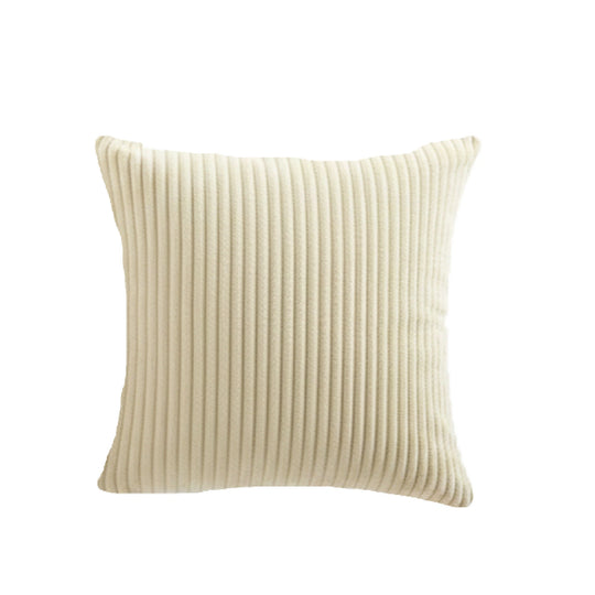 Beige ribbed pillow on a white background