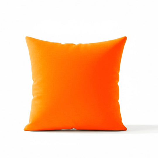 Orange pillow on a white background