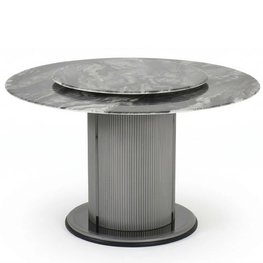 Round marble dining table with a metallic base on a white background