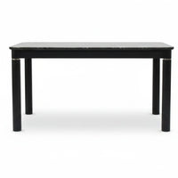 Black dining table with marble top on a white background