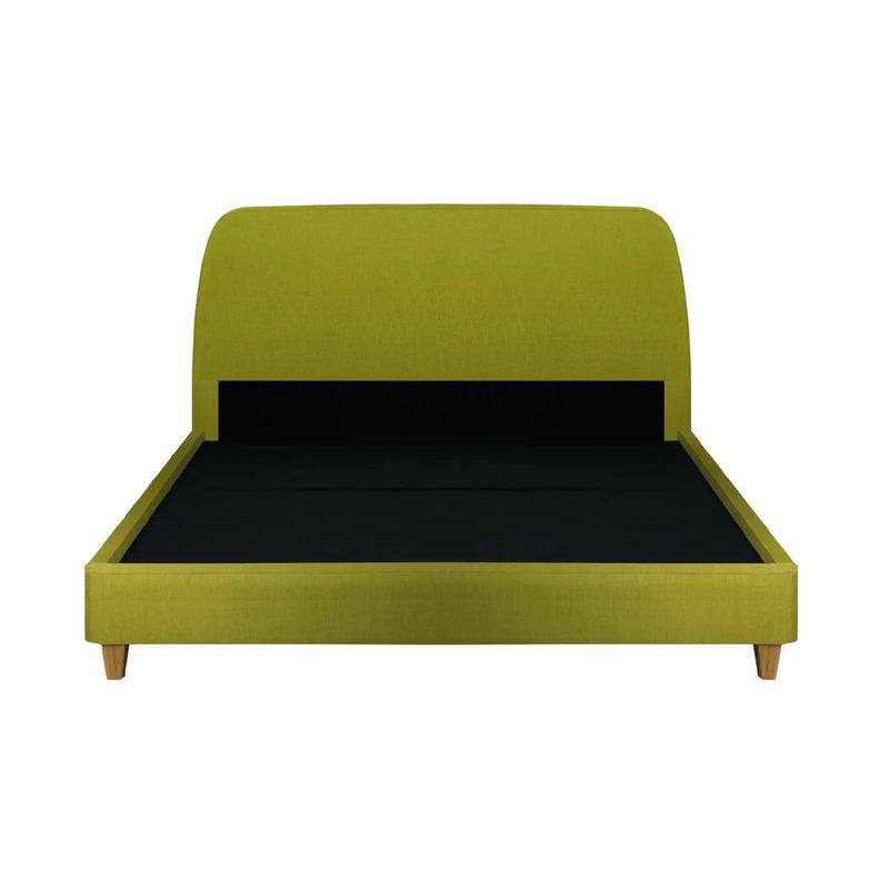 Green bed frame with black mattress on a white background