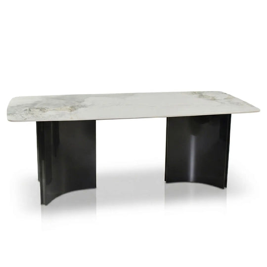 Modern coffee table with marble top and black base on a white background
