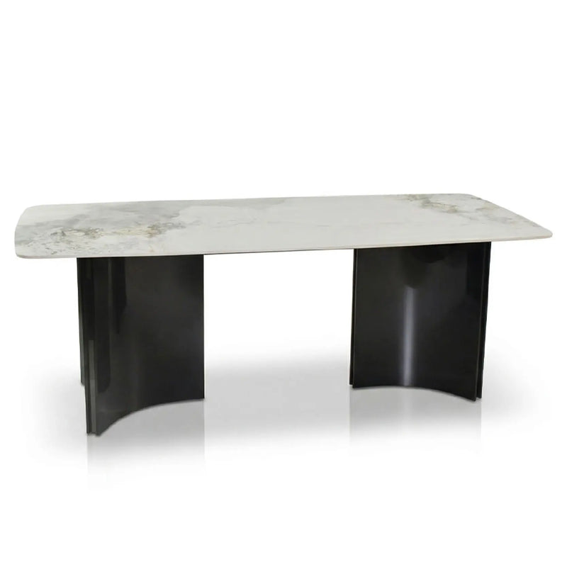 Modern coffee table with marble top and black base on a white background
