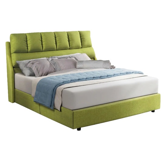 Green upholstered bed with gray bedding and a blue blanket on a white background