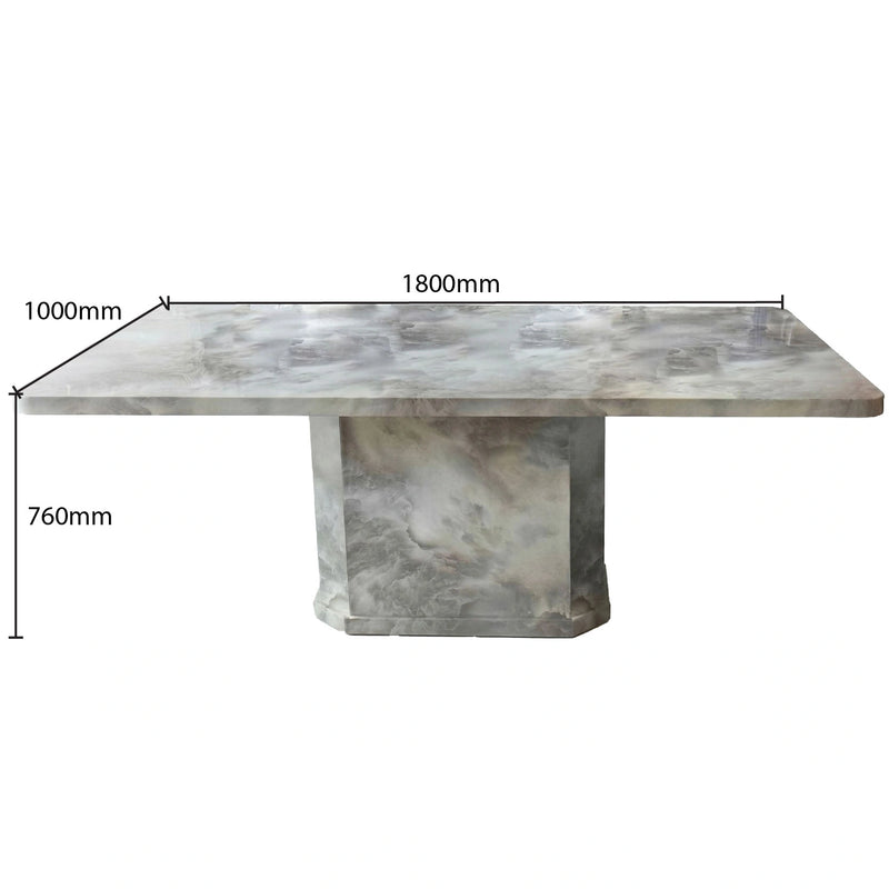Marble-patterned table with dimensions labeled on a white background