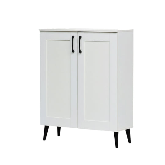 White cabinet with black legs and handles on a white background