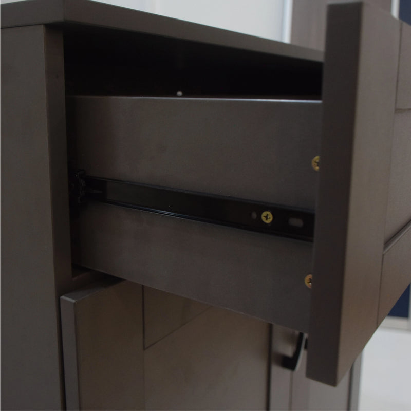 Close-up of a metallic cabinet with an open drawer.