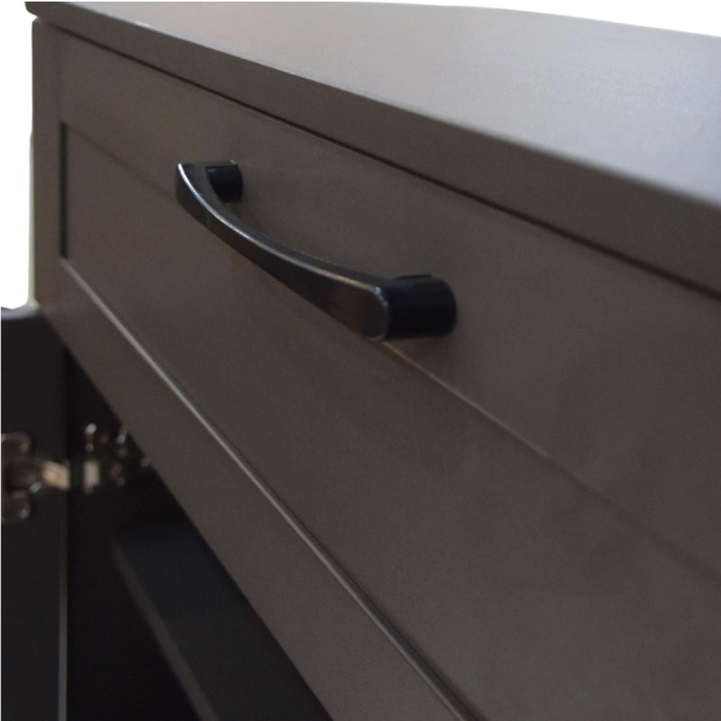 Close-up of a gray drawer with a black handle on a white background